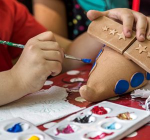 Children painting pottery at a workshop organized by the International Children's Day in Timisoara, Romania.